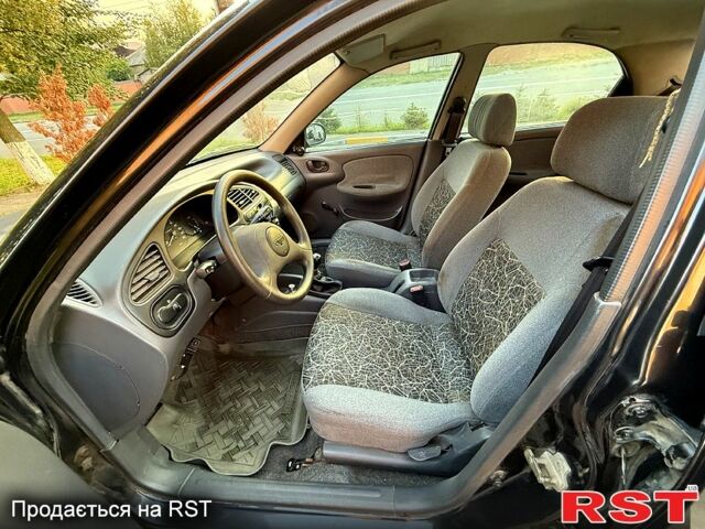 Серый Дэу Ланос, объемом двигателя 2 л и пробегом 280 тыс. км за 1250 $, фото 2 на Automoto.ua