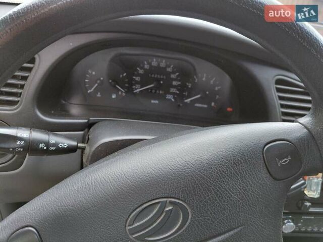 Сірий Деу Ланос, об'ємом двигуна 1.5 л та пробігом 137 тис. км за 2500 $, фото 2 на Automoto.ua