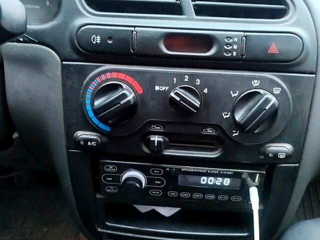 Сірий Деу Ланос, об'ємом двигуна 1.5 л та пробігом 201 тис. км за 3500 $, фото 8 на Automoto.ua