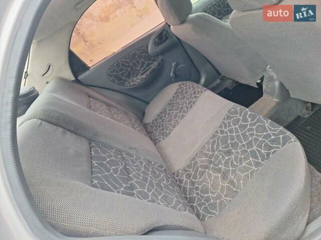 Сірий Деу Ланос, об'ємом двигуна 1.3 л та пробігом 111 тис. км за 1100 $, фото 19 на Automoto.ua