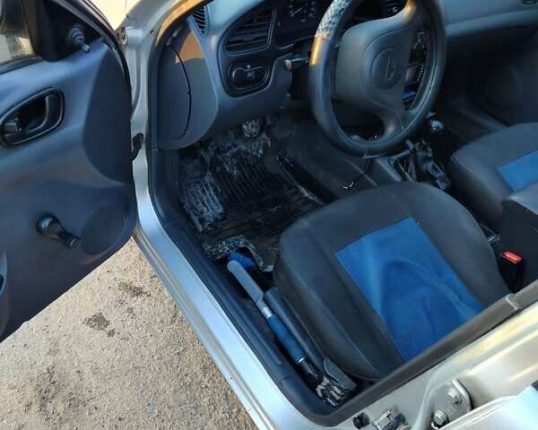 Серый Дэу Ланос, объемом двигателя 1.39 л и пробегом 120 тыс. км за 1500 $, фото 17 на Automoto.ua