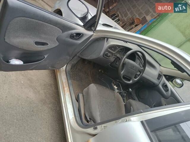 Серый Дэу Ланос, объемом двигателя 1.6 л и пробегом 234 тыс. км за 1699 $, фото 9 на Automoto.ua