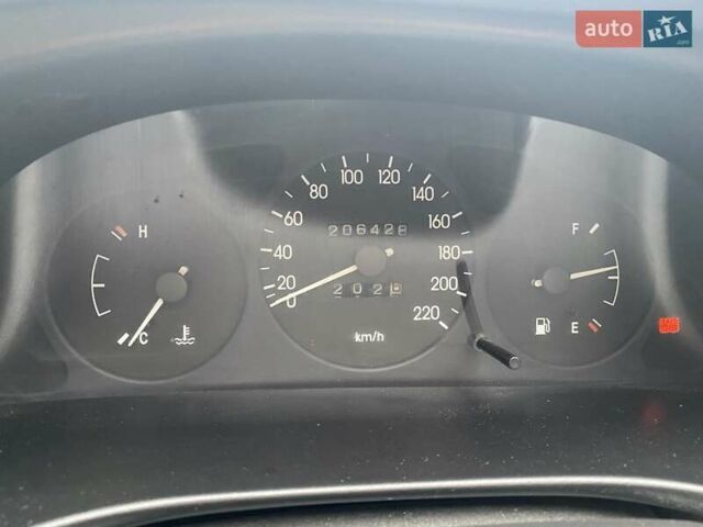 Сірий Деу Ланос, об'ємом двигуна 1.5 л та пробігом 207 тис. км за 1800 $, фото 4 на Automoto.ua