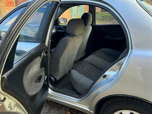 Серый Дэу Ланос, объемом двигателя 1.5 л и пробегом 270 тыс. км за 1500 $, фото 6 на Automoto.ua