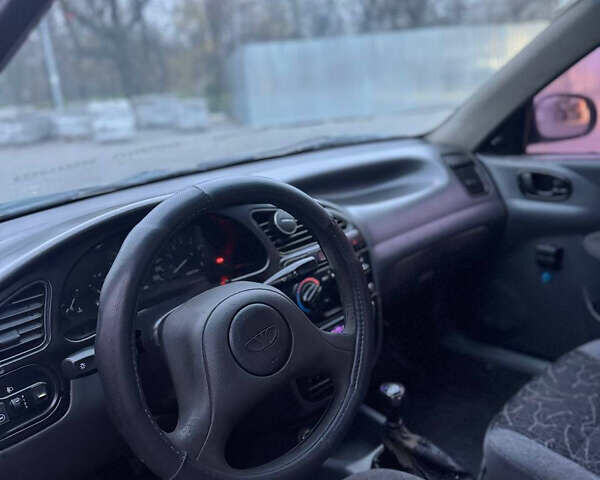 Сірий Деу Ланос, об'ємом двигуна 1.5 л та пробігом 230 тис. км за 1150 $, фото 6 на Automoto.ua