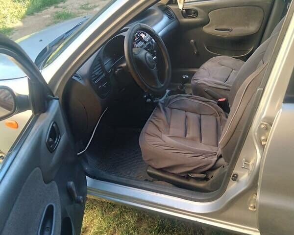 Сірий Деу Ланос, об'ємом двигуна 1.5 л та пробігом 252 тис. км за 1800 $, фото 4 на Automoto.ua