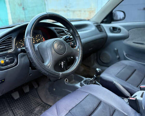 Серый Дэу Ланос, объемом двигателя 1.5 л и пробегом 62 тыс. км за 1650 $, фото 10 на Automoto.ua