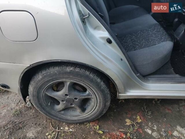 Сірий Деу Ланос, об'ємом двигуна 1.5 л та пробігом 320 тис. км за 1500 $, фото 1 на Automoto.ua
