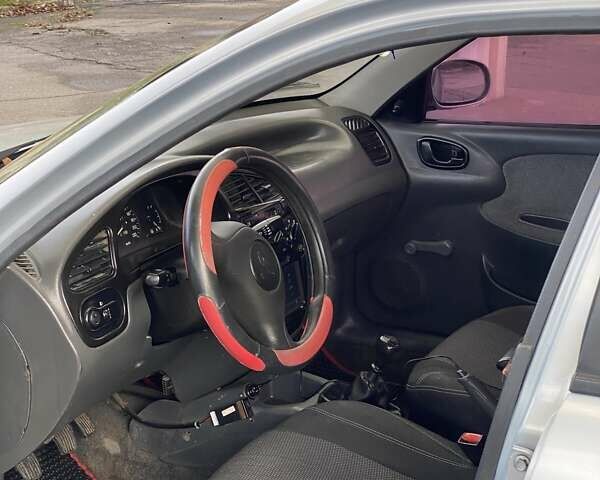 Серый Дэу Ланос, объемом двигателя 1.5 л и пробегом 278 тыс. км за 2000 $, фото 10 на Automoto.ua