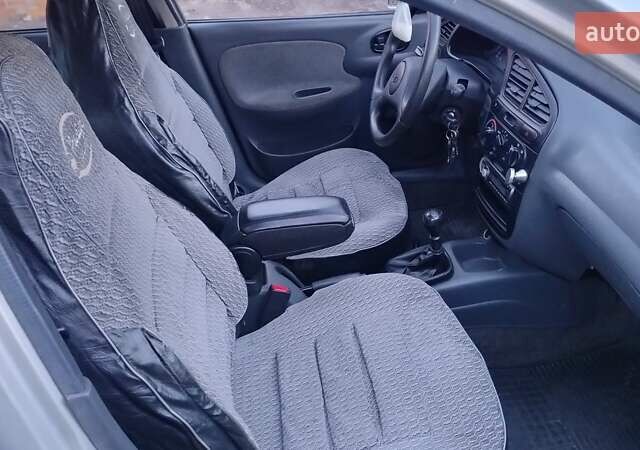 Деу Ланос 2007 у Житомирі на Automoto.ua Сірий Деу Ланос, об'ємом двигуна 1.5 л та пробігом 208 тис. км за 2499 $, фото 13 на Automoto.ua