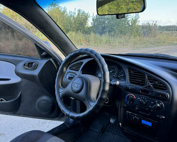 Серый Дэу Ланос, объемом двигателя 1.5 л и пробегом 290 тыс. км за 3000 $, фото 8 на Automoto.ua