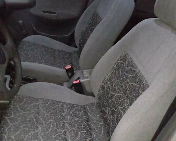 Деу Ланос 2007 у Полтаві на Automoto.ua Сірий Деу Ланос, об'ємом двигуна 1.5 л та пробігом 450 тис. км за 1750 $, фото 12 на Automoto.ua