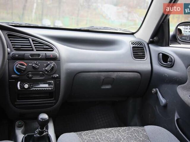 Сірий Деу Ланос, об'ємом двигуна 1.5 л та пробігом 109 тис. км за 1600 $, фото 12 на Automoto.ua