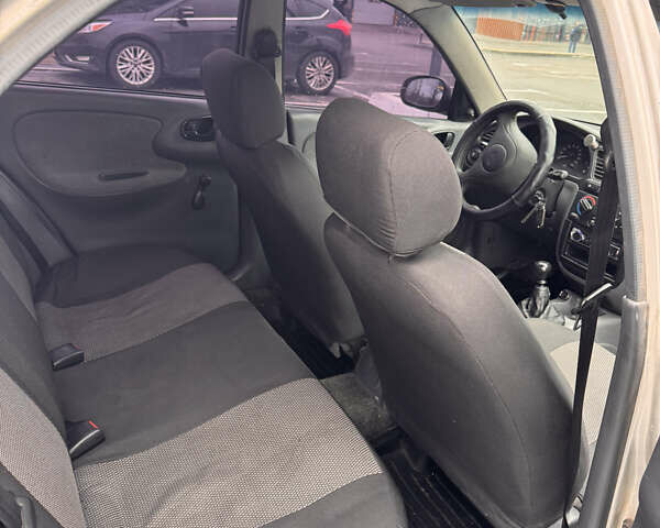 Сірий Деу Ланос, об'ємом двигуна 1.39 л та пробігом 314 тис. км за 1500 $, фото 10 на Automoto.ua