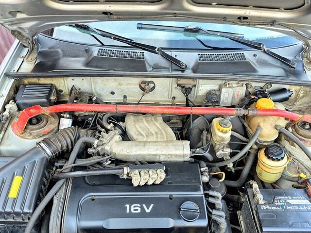 Серый Дэу Ланос, объемом двигателя 1.5 л и пробегом 220 тыс. км за 1500 $, фото 4 на Automoto.ua