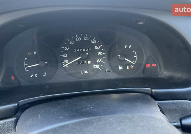 Сірий Деу Ланос, об'ємом двигуна 1.5 л та пробігом 240 тис. км за 1550 $, фото 20 на Automoto.ua