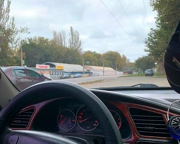 Сірий Деу Ланос, об'ємом двигуна 1.5 л та пробігом 384 тис. км за 2999 $, фото 12 на Automoto.ua