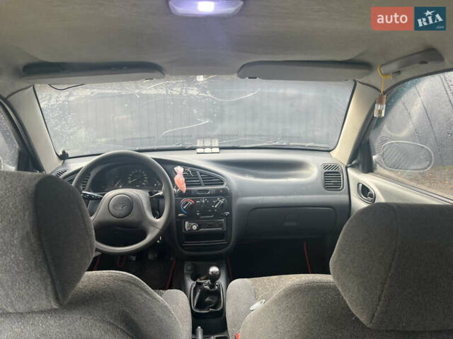 Сірий Деу Ланос, об'ємом двигуна 1.39 л та пробігом 220 тис. км за 2200 $, фото 5 на Automoto.ua