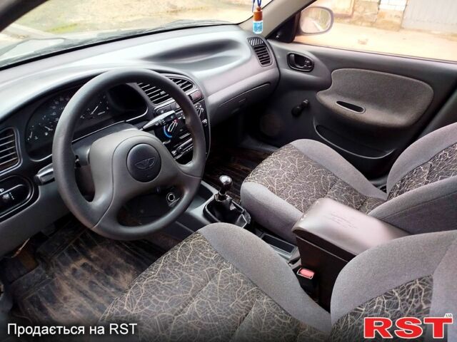 Серый Дэу Ланос, объемом двигателя 1.5 л и пробегом 200 тыс. км за 1550 $, фото 6 на Automoto.ua