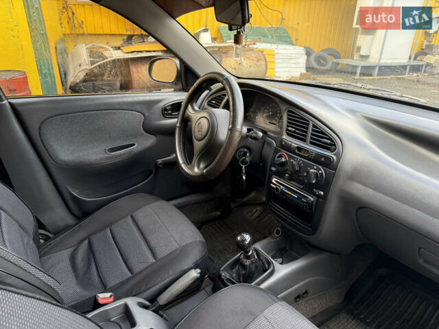 Сірий Деу Ланос, об'ємом двигуна 1.5 л та пробігом 200 тис. км за 2100 $, фото 7 на Automoto.ua