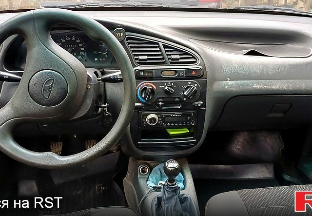 Серый Дэу Ланос, объемом двигателя 1.4 л и пробегом 340 тыс. км за 1950 $, фото 6 на Automoto.ua