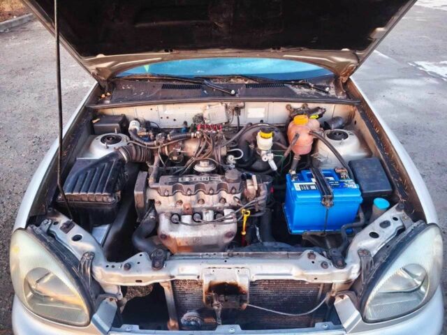 Серый Дэу Ланос, объемом двигателя 1.5 л и пробегом 40 тыс. км за 2000 $, фото 2 на Automoto.ua