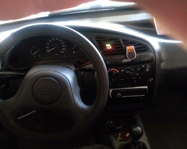 Сірий Деу Ланос, об'ємом двигуна 1.5 л та пробігом 252 тис. км за 1800 $, фото 7 на Automoto.ua