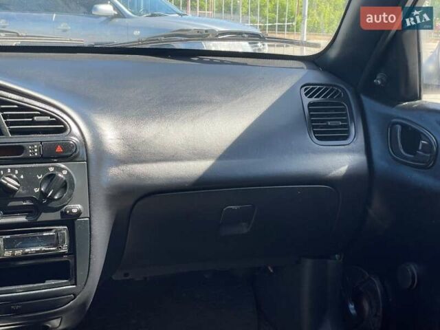 Серый Дэу Ланос, объемом двигателя 1.5 л и пробегом 290 тыс. км за 2500 $, фото 36 на Automoto.ua