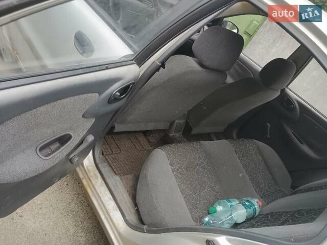 Серый Дэу Ланос, объемом двигателя 1.6 л и пробегом 234 тыс. км за 1699 $, фото 5 на Automoto.ua