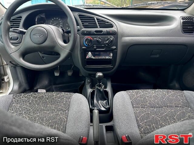 Серый Дэу Ланос, объемом двигателя 1.4 л и пробегом 63 тыс. км за 3090 $, фото 24 на Automoto.ua