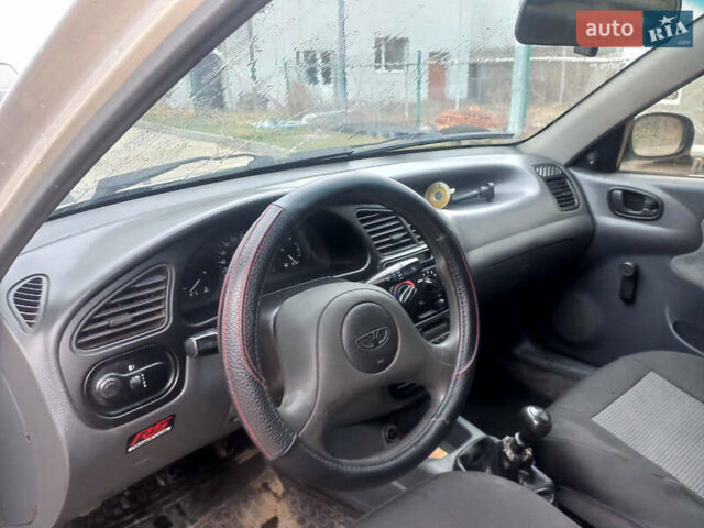 Серый Дэу Ланос, объемом двигателя 1.5 л и пробегом 357 тыс. км за 1100 $, фото 5 на Automoto.ua