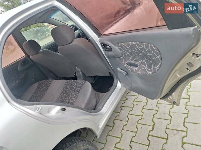 Сірий Деу Ланос, об'ємом двигуна 1.3 л та пробігом 111 тис. км за 1100 $, фото 18 на Automoto.ua