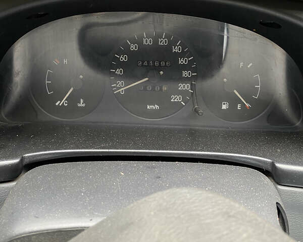 Сірий Деу Ланос, об'ємом двигуна 1.5 л та пробігом 241 тис. км за 1500 $, фото 8 на Automoto.ua