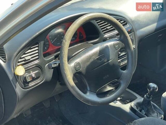 Серый Дэу Ланос, объемом двигателя 1.5 л и пробегом 290 тыс. км за 2500 $, фото 37 на Automoto.ua