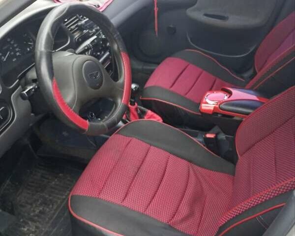 Сірий Деу Ланос, об'ємом двигуна 1.5 л та пробігом 170 тис. км за 2300 $, фото 1 на Automoto.ua