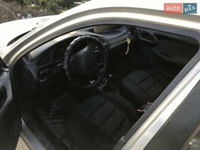 Сірий Деу Ланос, об'ємом двигуна 1.5 л та пробігом 987 тис. км за 1800 $, фото 4 на Automoto.ua