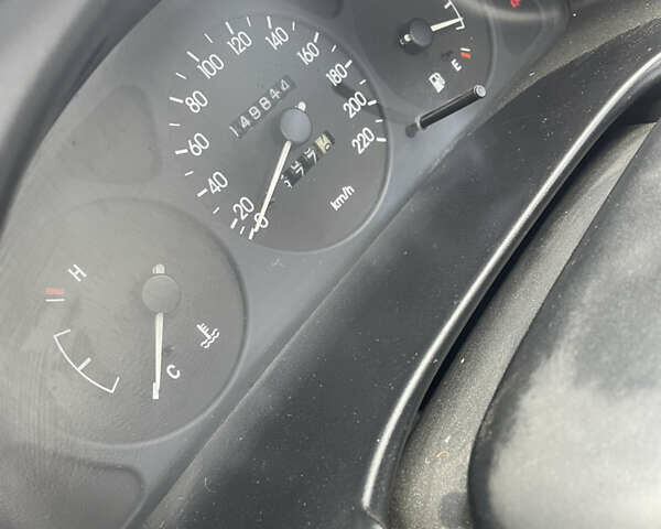 Сірий Деу Ланос, об'ємом двигуна 1.35 л та пробігом 150 тис. км за 1700 $, фото 9 на Automoto.ua