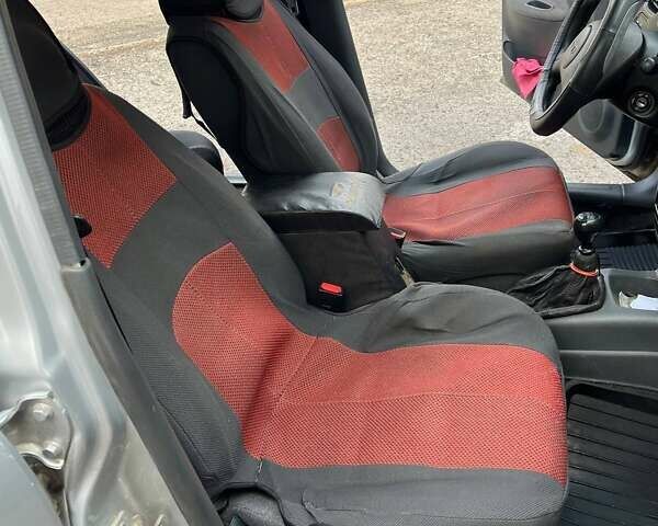 Сірий Деу Ланос, об'ємом двигуна 1.39 л та пробігом 137 тис. км за 2800 $, фото 8 на Automoto.ua