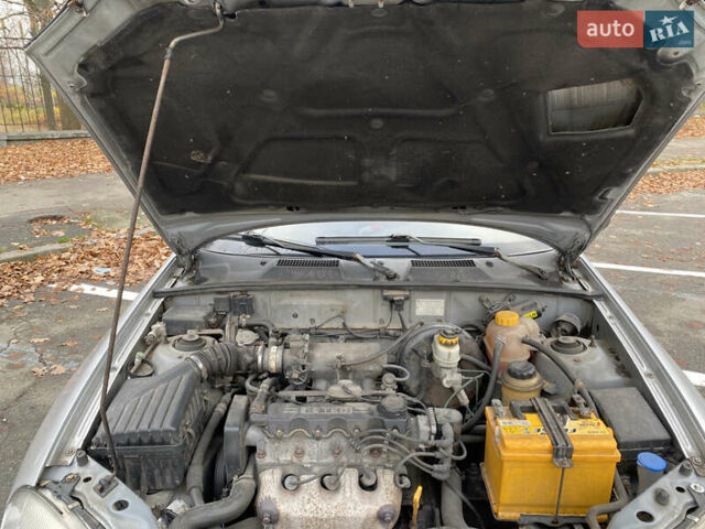 Серый Дэу Ланос, объемом двигателя 1.5 л и пробегом 315 тыс. км за 2600 $, фото 22 на Automoto.ua