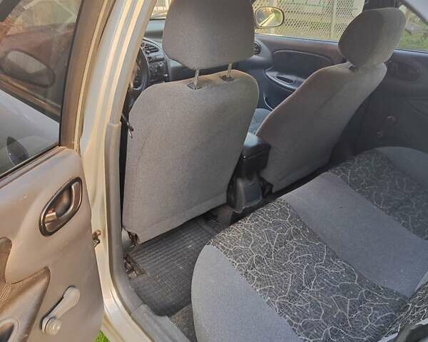 Серый Дэу Ланос, объемом двигателя 1.4 л и пробегом 239 тыс. км за 2100 $, фото 2 на Automoto.ua