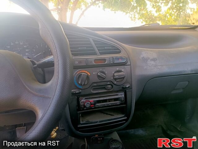 Серый Дэу Ланос, объемом двигателя 1.5 л и пробегом 200 тыс. км за 1150 $, фото 4 на Automoto.ua