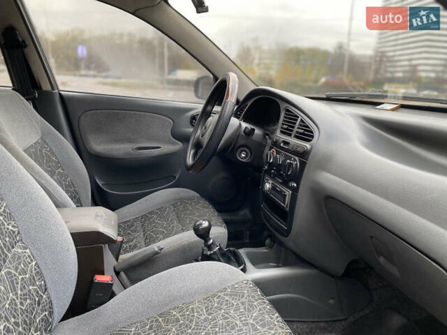 Серый Дэу Ланос, объемом двигателя 1.5 л и пробегом 315 тыс. км за 2600 $, фото 17 на Automoto.ua