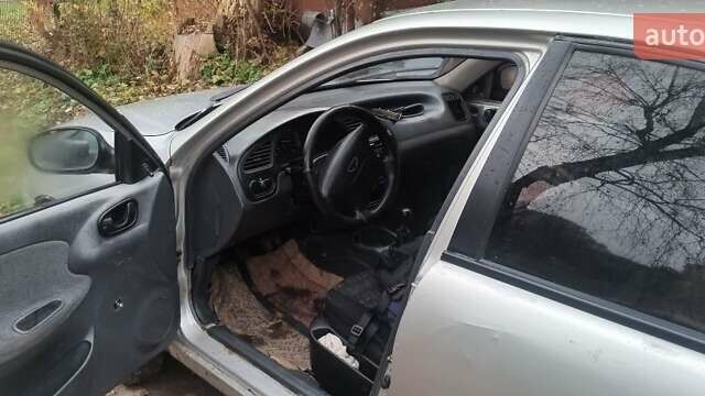 Серый Дэу Ланос, объемом двигателя 1.4 л и пробегом 210 тыс. км за 1100 $, фото 2 на Automoto.ua