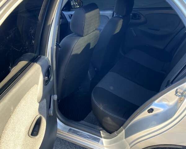 Сірий Деу Ланос, об'ємом двигуна 1.5 л та пробігом 259 тис. км за 2000 $, фото 2 на Automoto.ua