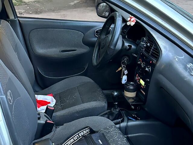 Сірий Деу Ланос, об'ємом двигуна 1.4 л та пробігом 183 тис. км за 1650 $, фото 7 на Automoto.ua