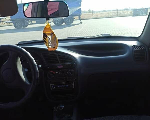 Дэу Ланос 2007 в Новомосковске на Automoto.ua Серый Дэу Ланос, объемом двигателя 1.5 л и пробегом 324 тыс. км за 2300 $, фото 18 на Automoto.ua