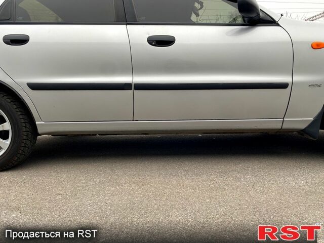 Сірий Деу Ланос, об'ємом двигуна 1.6 л та пробігом 150 тис. км за 3160 $, фото 7 на Automoto.ua