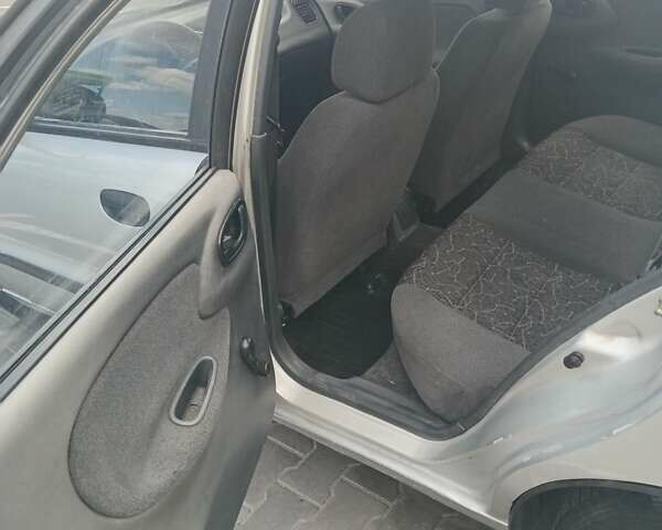 Серый Дэу Ланос, объемом двигателя 1.5 л и пробегом 225 тыс. км за 2400 $, фото 4 на Automoto.ua