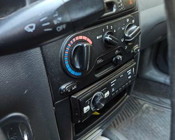 Серый Дэу Ланос, объемом двигателя 1.5 л и пробегом 253 тыс. км за 1700 $, фото 7 на Automoto.ua