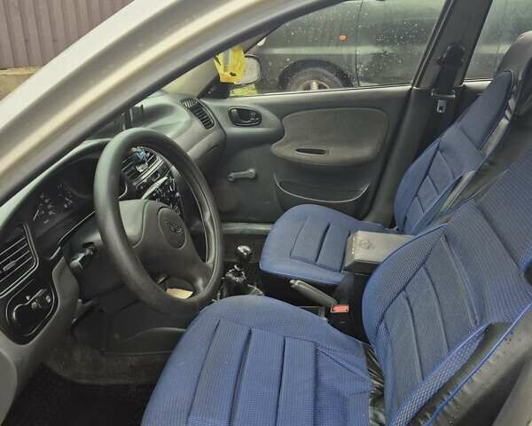 Серый Дэу Ланос, объемом двигателя 1.5 л и пробегом 242 тыс. км за 2100 $, фото 3 на Automoto.ua